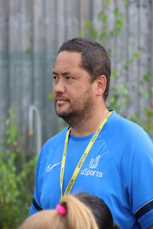 A uSports coach watching a session