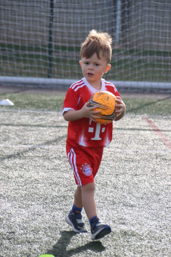Children at a uSports toddler football class