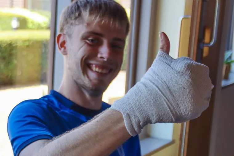 A uSports coach giving a thumbs up