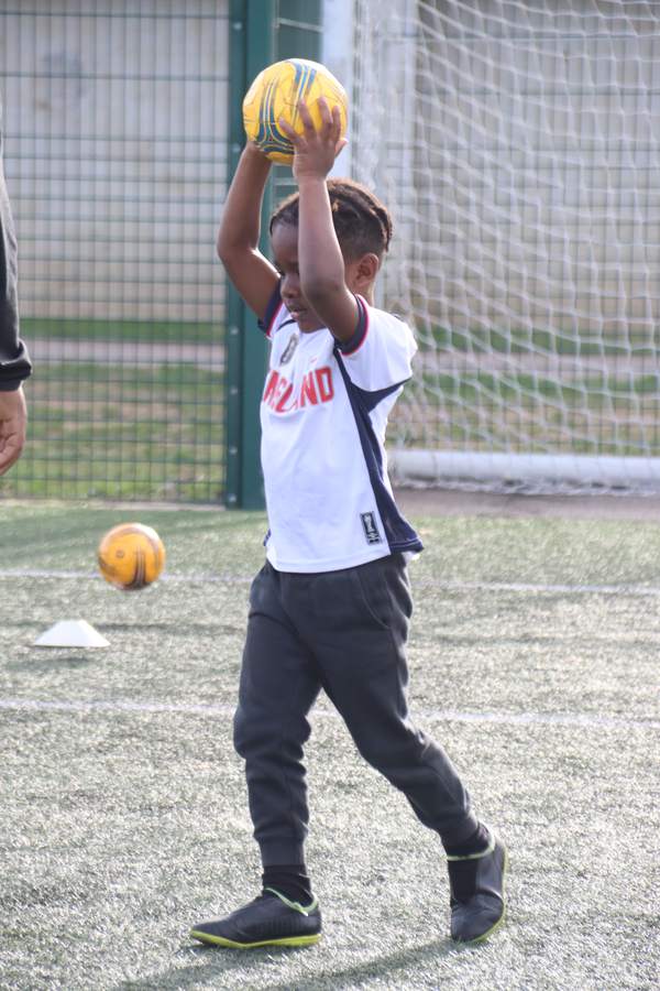 Children at a uSports infant football development centre
