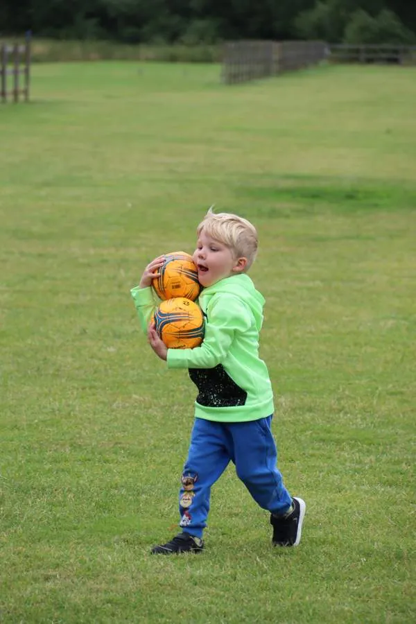 Children at a uSports toddler football class
