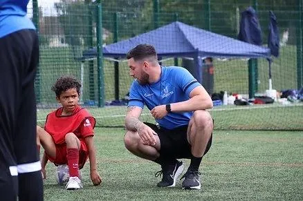 uSports coaches with children