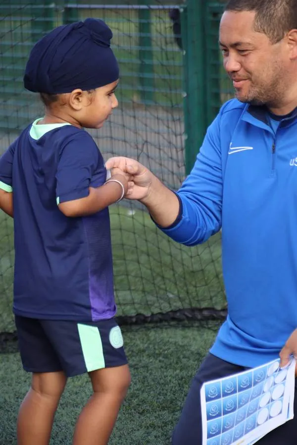 Children at a uSports toddler football class