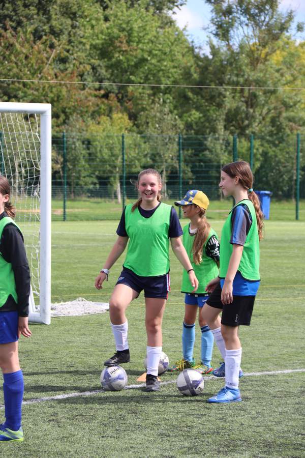 Girls at a uSports girls only football holiday camp
