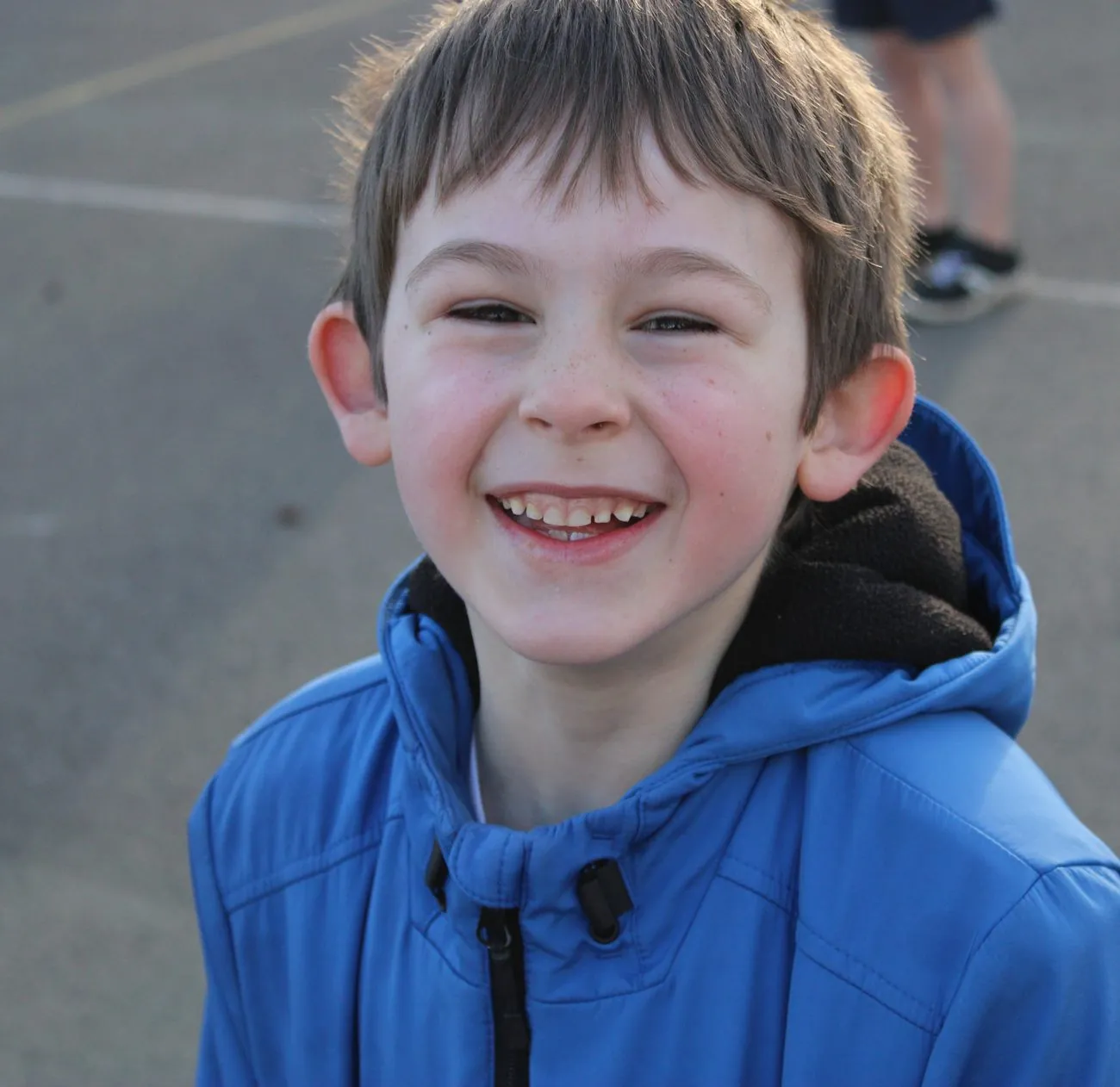 A child smiling at a uSports session