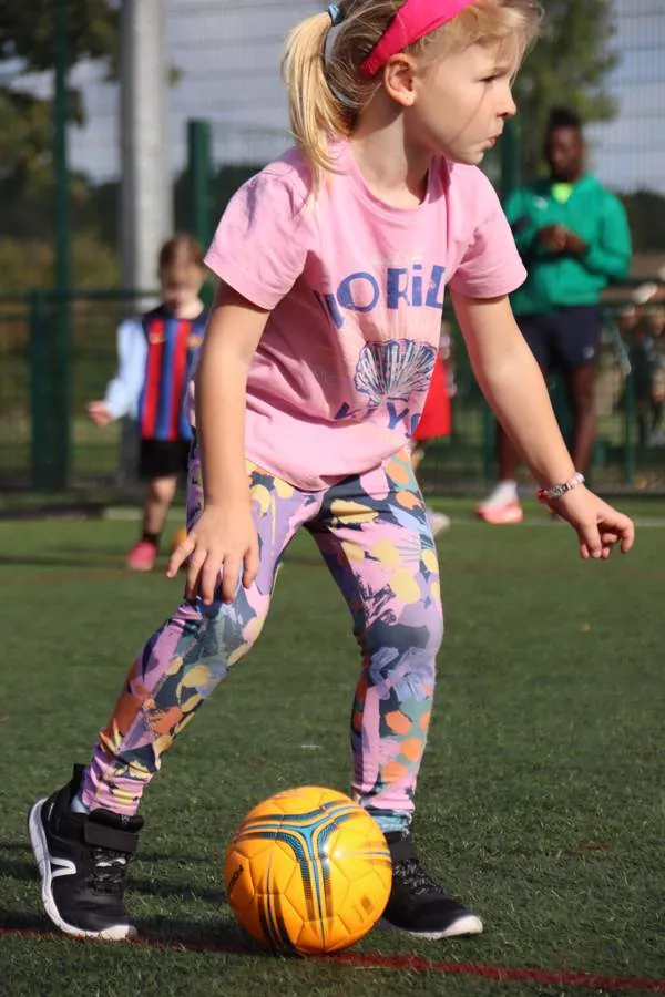 Children at a uSports infant football development centre